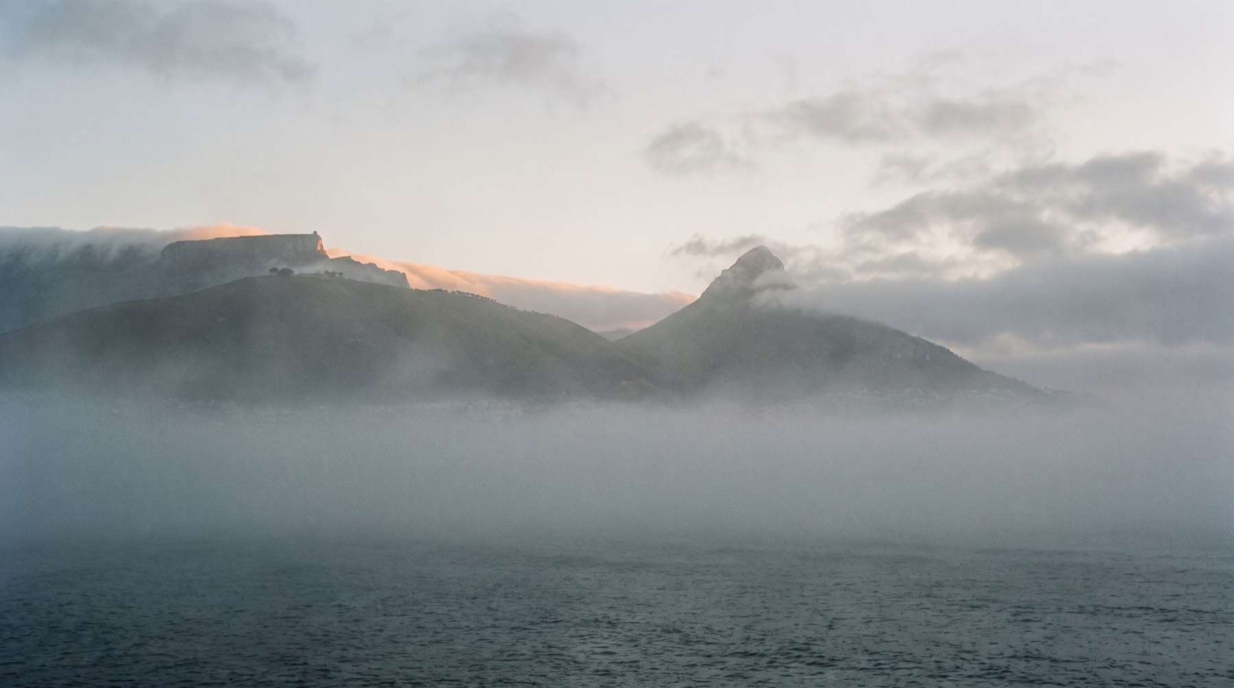 Sea fog over Signal Hill at first light